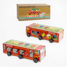 Машина логічна C 68271 (12) дерев`яна, стукалка, гра “Грядка з морквинками”, сортер, знімні ігрові панелі, картки із завданнями