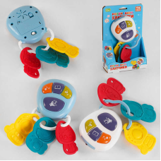 Музичне брязкальце 22450 (120/2) TK Group“, 2 кольори, ОЗВУЧ. УКРАЇНСЬКОЮ МОВОЮ, підсвічування, звук, пісня, віршик, мелодія, 3 прорізувачі, в коробці