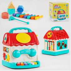 Музичний будиночок 76263 (18) “TK Group“, ОЗВУЧУВАННЯ УКРАЇНСЬКОЮ МОВОЮ, магнітна гра з хробачками, 4 пісні, мелодії, фігури, цифри, піаніно, барабан, підсвічування, в коробці 