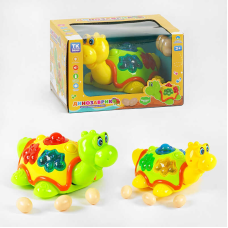 Музичний динозаврик TK - 50633 (48/2) “TK Group“, 2 кольори, ОЗВУЧУВАННЯ УКРАЇНСЬКОЮ МОВОЮ, світло, колесо вільного руху, пісня, яйця, в коробці
