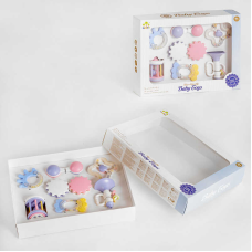 Набір брязкалець SL 84817 (24/2)два прорізувачі, два свистки, брязкальця з наповнювачем, в коробці