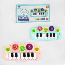 Піаніно “Музичні веселощі” TK - 10230 (180/2) “TK Group“, 2 кольори,  ОЗВУЧУВАННЯ УКРАЇНСЬКОЮ МОВОЮ, пісні, казки, ноти, скоромовки, підсвічування, в коробці