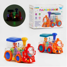 Паровозик ТК 52136 (48) “WToys“, 2 кольори, ОЗВУЧУВАННЯ УКРАЇНСЬКОЮ МОВОЮ, звук, підсвічування, шестерні, колесо вільного ходу, в коробці