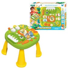 Інтерактивний столик “Ігрозаврик“ 17464 (12) “WToys“, ОЗВУЧУВАННЯ УКРАЇНСЬКОЮ МОВОЮ, підсвічування, 10 скоромовок, 10 казок, 10 пісень, барабани, піаніно, рухомі елементи, пискавка, ноти, звуки, ігри, в коробці
