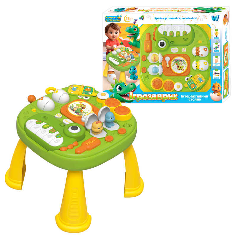 Інтерактивний столик “Ігрозаврик“ 17464 (12) “WToys“, ОЗВУЧУВАННЯ УКРАЇНСЬКОЮ МОВОЮ, підсвічування, 10 скоромовок, 10 казок, 10 пісень, барабани, піаніно, рухомі елементи, пискавка, ноти, звуки, ігри, в коробці