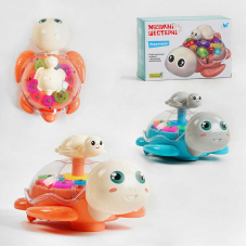 Гра музична 49033 (96) “W Toys“, ОЗВУЧУВАННЯ УКРАЇНСЬКОЮ МОВОЮ, “Черепашка“, світло, звук, прозорий корпус, шестерні, колесо вільного ходу, в коробці