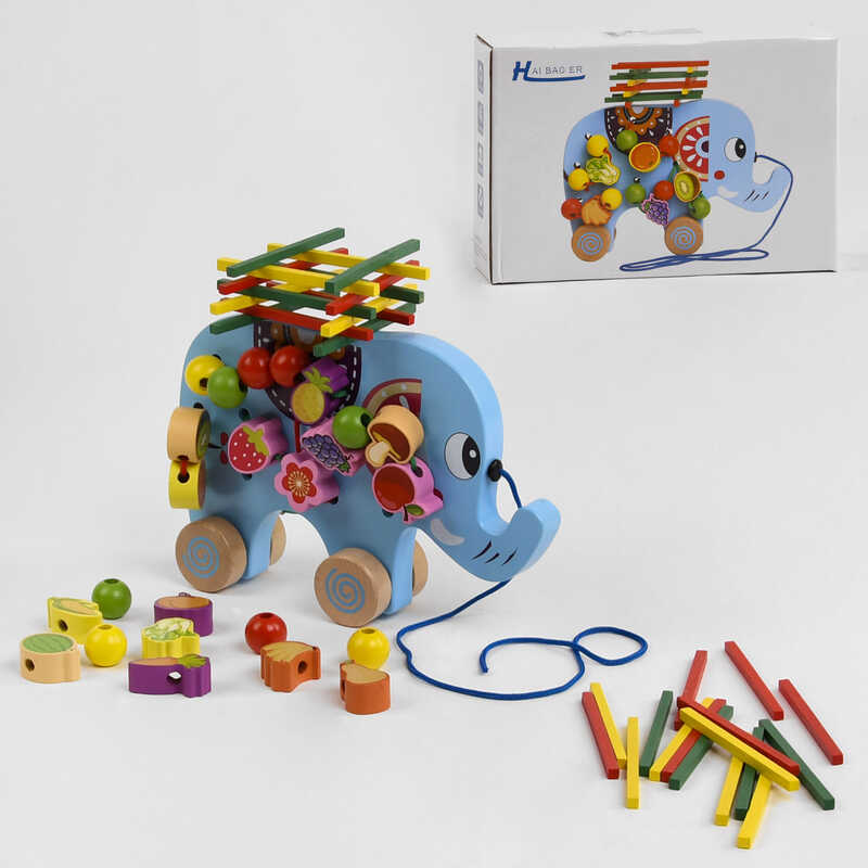 Дерев“яна каталка C 48174 (36) “Слоненя“, шнурівка, брусочки, в коробці