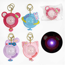 Брелок зі світлом C 66552 (600) ЦІНА ЗА 1 ШТУКУ, гумові елементи, диско-куля, в пакеті